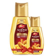 DABUR ALMOND HAIR OIL .